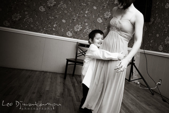 Son hugging her mom, one of the bridesmaid. Kitty Knight House Georgetown Chestertown MD Wedding Photographer