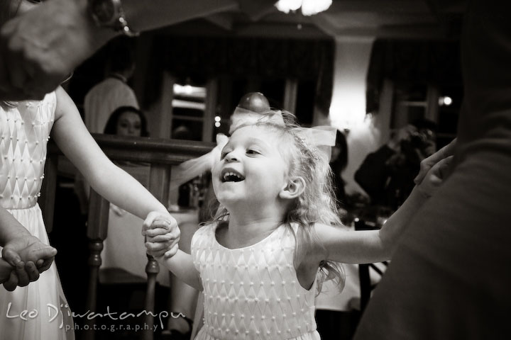 The flower girl dancing. Kitty Knight House Georgetown Chestertown MD Wedding Photographer