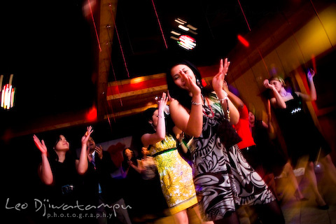 girls clapping hand dancing at party