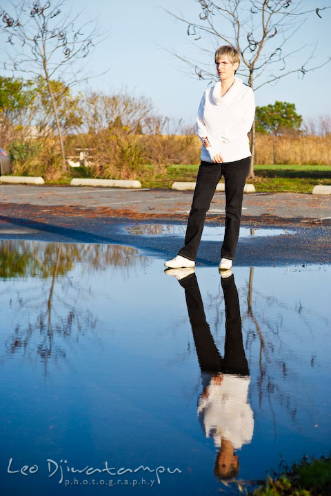 Lady writer posing, reflection on water. Commercial work book writer portrait photographer Annapolis, Kent Island, Eastern Shore, Maryland