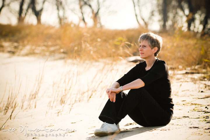 Female  writer sitting on the beach, white sand. Commercial work book writer  portrait photographer Annapolis, Kent Island, Eastern Shore, Maryland