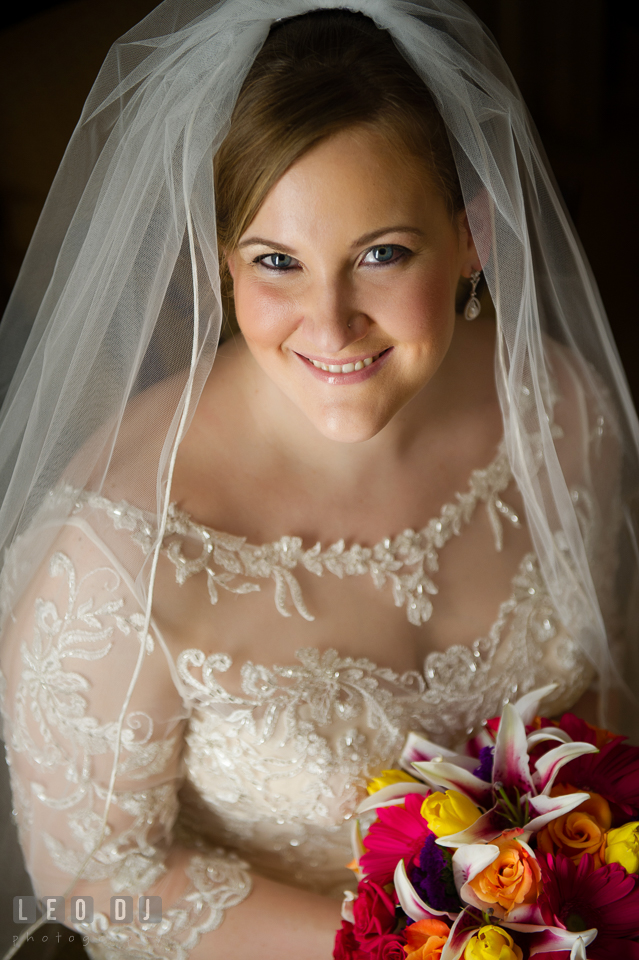 Beauty shot of Bride in her wedding dress, with veil and flower bouquet. The Tidewater Inn wedding, Easton, Eastern Shore, Maryland, by wedding photographers of Leo Dj Photography. http://leodjphoto.com