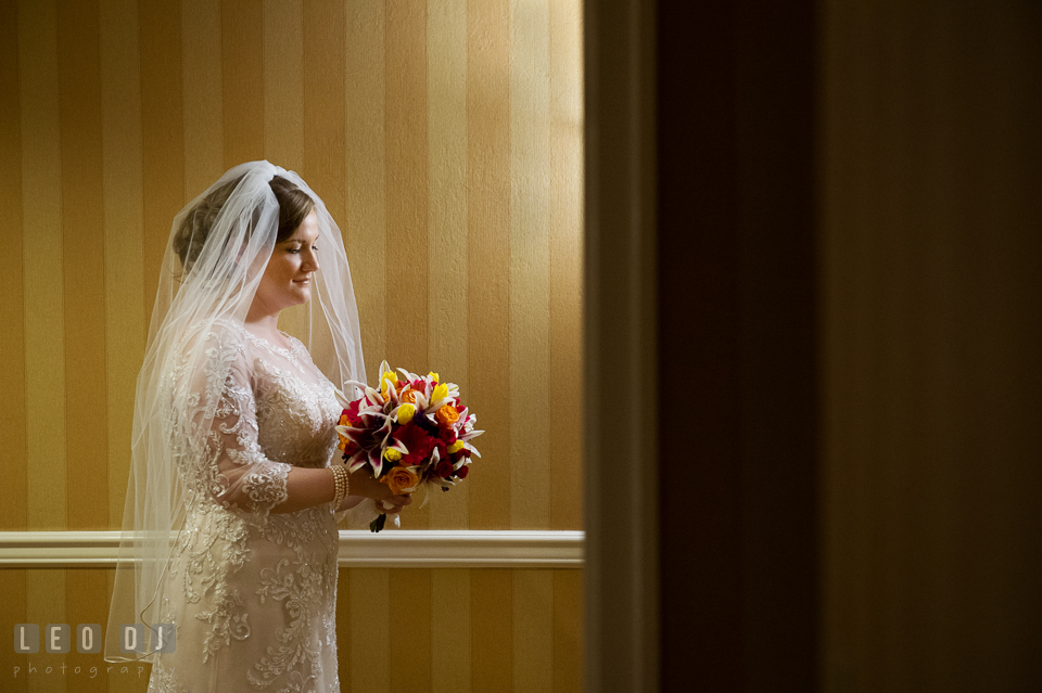 Shot of Bride looking at her bouquet. The Tidewater Inn wedding, Easton, Eastern Shore, Maryland, by wedding photographers of Leo Dj Photography. http://leodjphoto.com