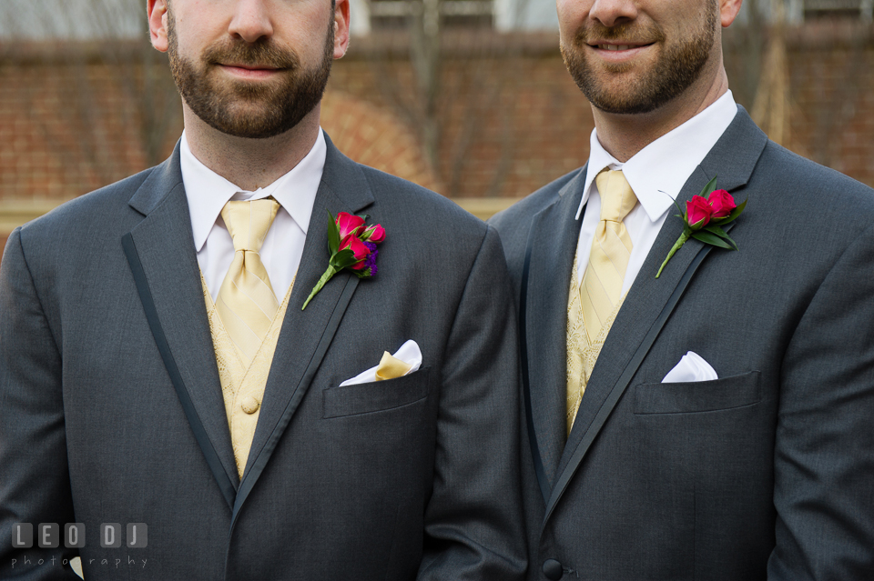 Groom and Best Man showing their boutonniere by Florist Robin's Nest. The Tidewater Inn wedding, Easton, Eastern Shore, Maryland, by wedding photographers of Leo Dj Photography. http://leodjphoto.com