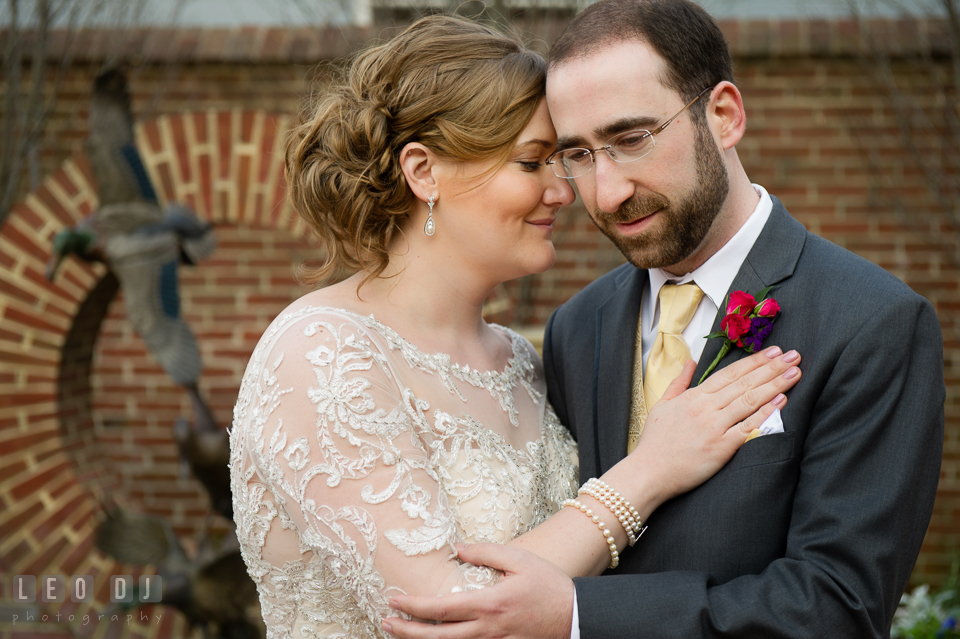 Bride and Groom snuggling during their romantic session. The Tidewater Inn wedding, Easton, Eastern Shore, Maryland, by wedding photographers of Leo Dj Photography. http://leodjphoto.com