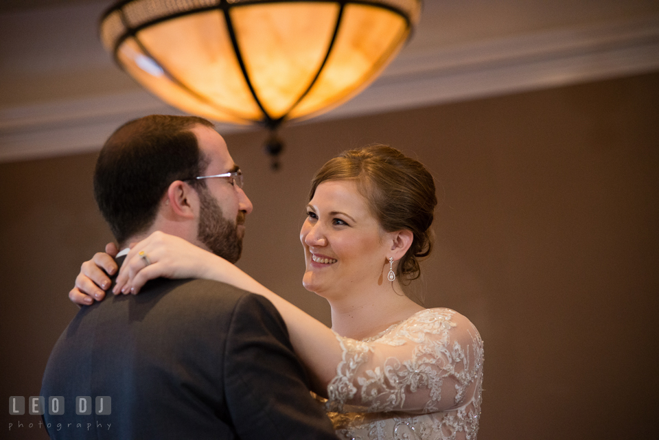 Bride and Groom smiling during their first dance. The Tidewater Inn wedding, Easton, Eastern Shore, Maryland, by wedding photographers of Leo Dj Photography. http://leodjphoto.com