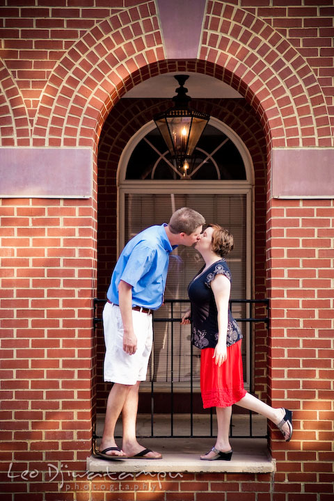 Engaged couple kissing under an arch. Engagement Pre-wedding Photo Session Bel Air Maryland wedding photographer