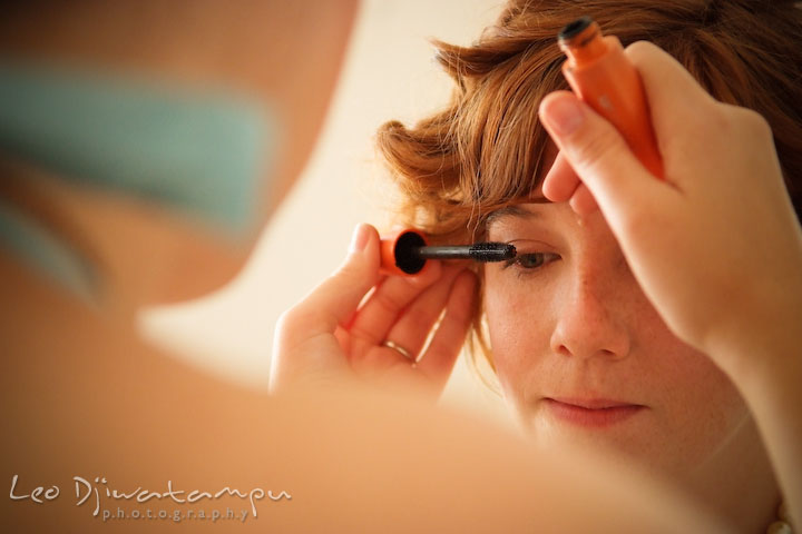 Bride getting ready, getting mascara for eyelashes. Rock Hall, Chestertown, Kingstown, and Georgetown Maryland wedding photographer, Leo Dj Photography