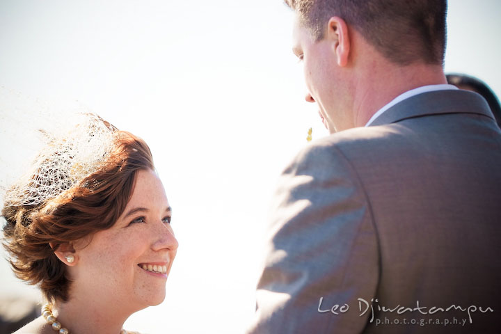 Bride smiling to groom. Rock Hall, Chestertown, Kingstown, and Georgetown Maryland wedding photographer, Leo Dj Photography