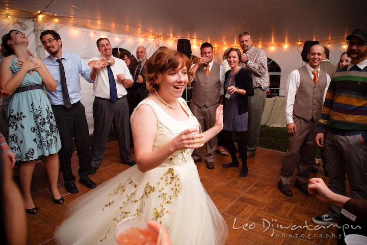 Bride dancing in a dance show off in a crowd circle. Rock Hall, Chestertown, Kingstown, and Georgetown Maryland wedding photographer, Leo Dj Photography