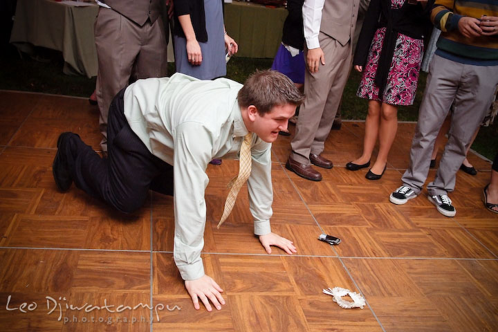 A male guest dancing on the floor. Rock Hall, Chestertown, Kingstown, and Georgetown Maryland wedding photographer, Leo Dj Photography