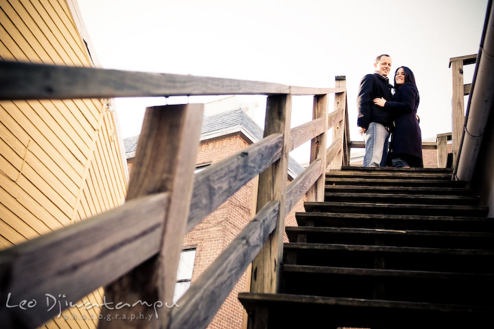 engaged couple on top of stairs. Urban City Pre-wedding Engagement Photographer Annapolis MD