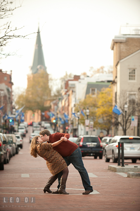 Engaged couple doing the dip and kissed on the Main Street Annapolis Downtown. Pre-wedding engagement photo session at Annapolis, Eastport, Maryland, Quiet Waters Park, by wedding photographers of Leo Dj Photography. http://leodjphoto.com