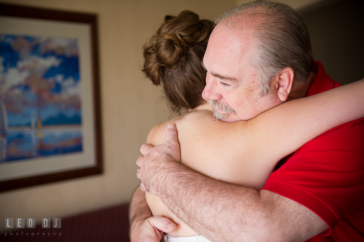 Father of Bride and daughter hugging. Kent Island Maryland Matapeake Beach wedding ceremony and getting ready photo, by wedding photographers of Leo Dj Photography. http://leodjphoto.com