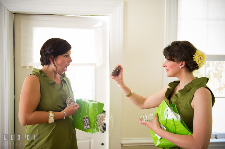 Bridesmaid and Maid of Honor opening gifts from Bride. Kent Island Maryland Matapeake Beach wedding ceremony and getting ready photo, by wedding photographers of Leo Dj Photography. http://leodjphoto.com