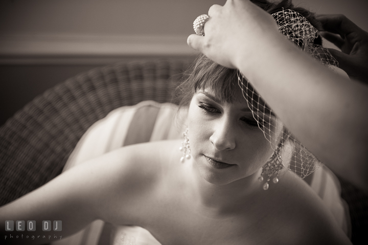 Bride getting mesh birdcage veil on. Kent Island Maryland Matapeake Beach wedding ceremony and getting ready photo, by wedding photographers of Leo Dj Photography. http://leodjphoto.com