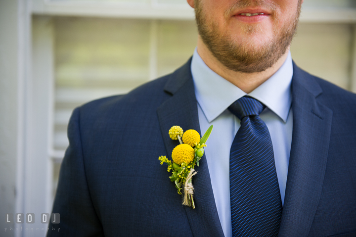 Detail shot of Groom's boutonniere. Kent Island Maryland Matapeake Beach wedding ceremony and getting ready photo, by wedding photographers of Leo Dj Photography. http://leodjphoto.com