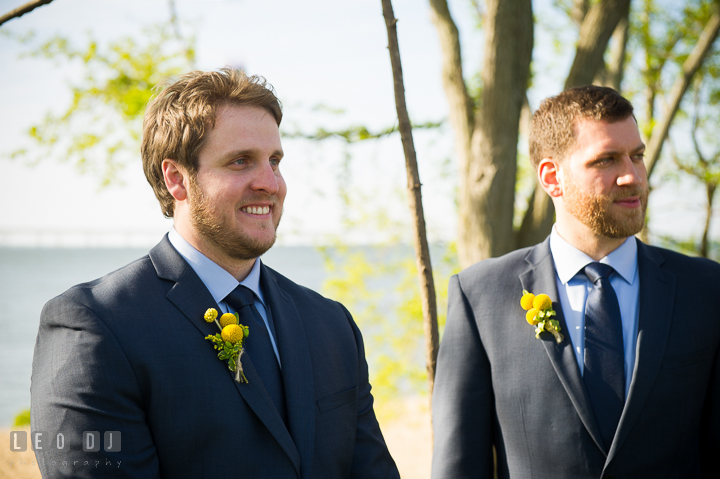 Groom smiling seeing Bride the first time in her wedding gown. Kent Island Maryland Matapeake Beach wedding ceremony and getting ready photo, by wedding photographers of Leo Dj Photography. http://leodjphoto.com