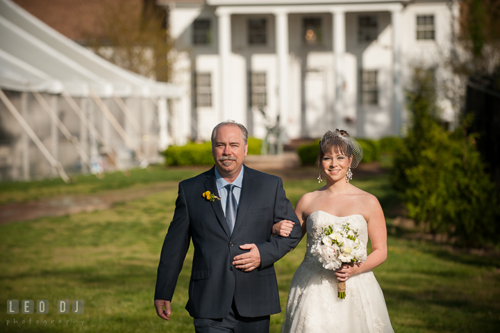 Father of the Bride escorting his daughter walk down the isle. Kent Island Maryland Matapeake Beach wedding ceremony and getting ready photo, by wedding photographers of Leo Dj Photography. http://leodjphoto.com