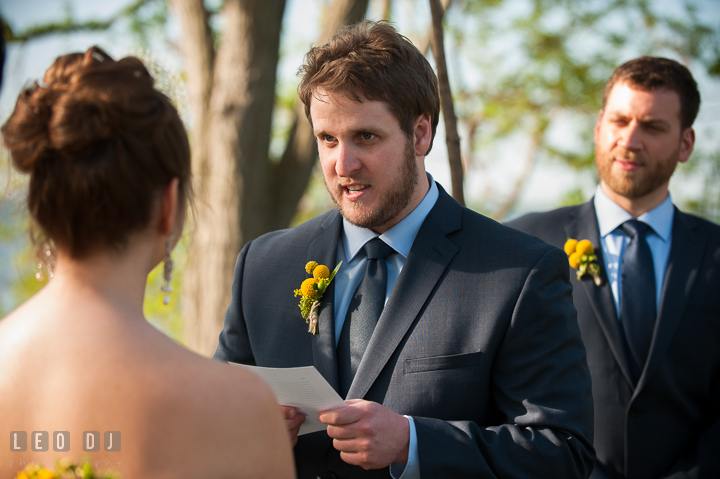 Groom reading vow to Bride. Kent Island Maryland Matapeake Beach wedding ceremony and getting ready photo, by wedding photographers of Leo Dj Photography. http://leodjphoto.com