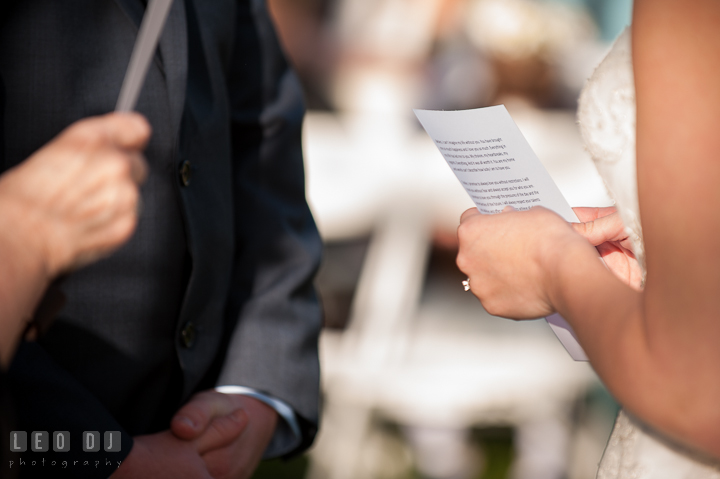 Bride reading her personalized vow to Groom. Kent Island Maryland Matapeake Beach wedding ceremony and getting ready photo, by wedding photographers of Leo Dj Photography. http://leodjphoto.com