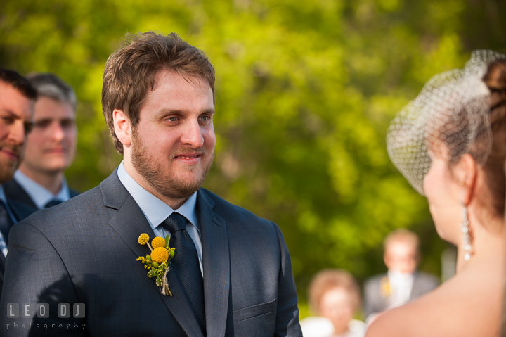 Groom emotional listening to Bride's vow. Kent Island Maryland Matapeake Beach wedding ceremony and getting ready photo, by wedding photographers of Leo Dj Photography. http://leodjphoto.com