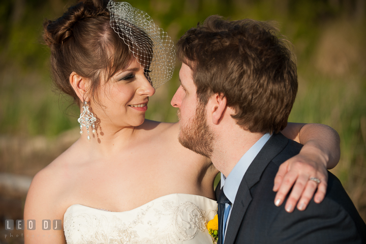 Bride and Groom looking at each other. Kent Island Maryland Matapeake Beach wedding reception party and romantic session photo, by wedding photographers of Leo Dj Photography. http://leodjphoto.com