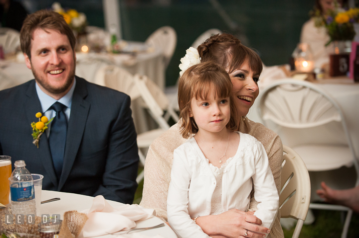 Bride and Groom laughing listening to Maid of Honor's toast speech. Kent Island Maryland Matapeake Beach wedding reception party and romantic session photo, by wedding photographers of Leo Dj Photography. http://leodjphoto.com