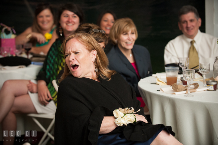 Mother of Bride surprised listening to Maid of Honor's toast speech. Kent Island Maryland Matapeake Beach wedding reception party and romantic session photo, by wedding photographers of Leo Dj Photography. http://leodjphoto.com