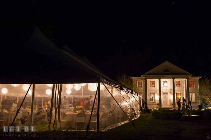 Evening view of the Clubhouse and tent at the venue. Kent Island Maryland Matapeake Beach wedding reception party and romantic session photo, by wedding photographers of Leo Dj Photography. http://leodjphoto.com