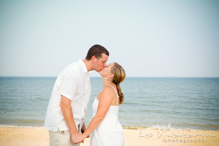 Bride and groom kissing on the beach. Cove Creek Country Club, Stevensville, Kent Island, Eastern Shore, Maryland Wedding Photographer, beach wedding photographer