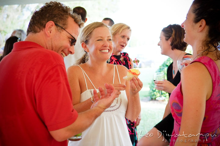 Bride laughing and having fun with guests. Cove Creek Country Club, Stevensville, Kent Island, Eastern Shore, Maryland Wedding Photographer, beach wedding photographer