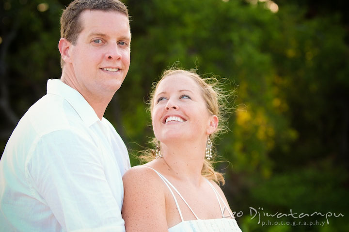 Bride cuddling and looking up at groom. Cove Creek Country Club, Stevensville, Kent Island, Eastern Shore, Maryland Wedding Photographer, beach wedding photographer