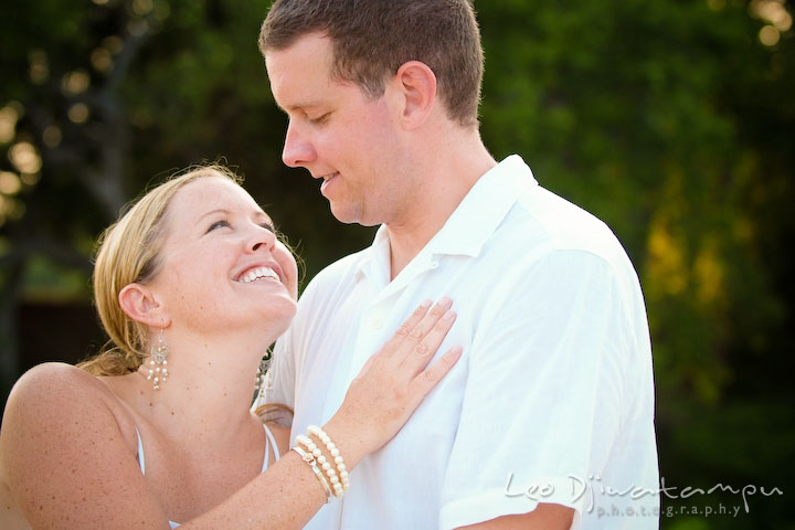 Bride and groom smiling and looking at each other. Cove Creek Country Club, Stevensville, Kent Island, Eastern Shore, Maryland Wedding Photographer, beach wedding photographer