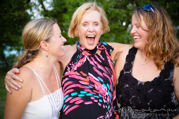 Bride laughing together with mother and sister. Cove Creek Country Club, Stevensville, Kent Island, Eastern Shore, Maryland Wedding Photographer, beach wedding photographer