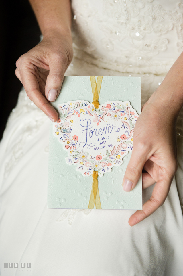 Westin Annapolis Hotel Bride holding card from groom photo by Leo Dj Photography