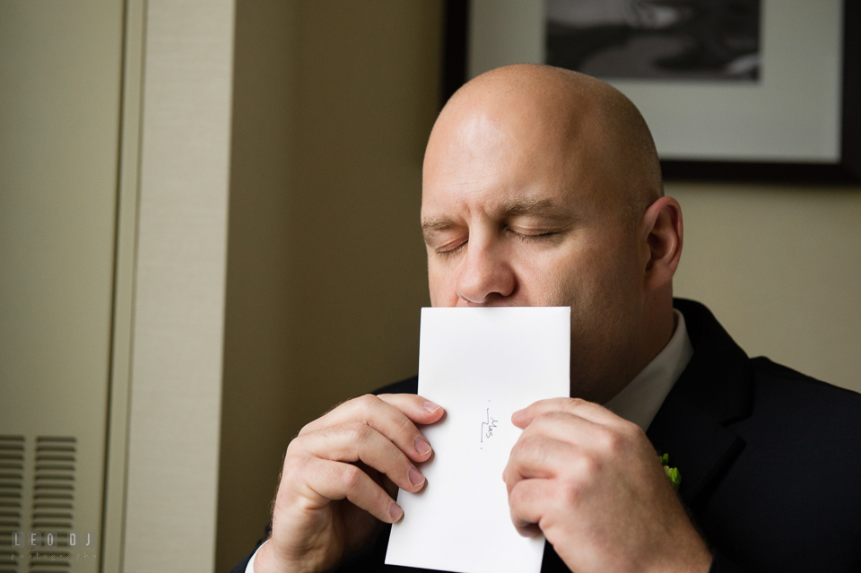 Westin Annapolis Hotel groom kissing card from bride photo by Leo Dj Photography