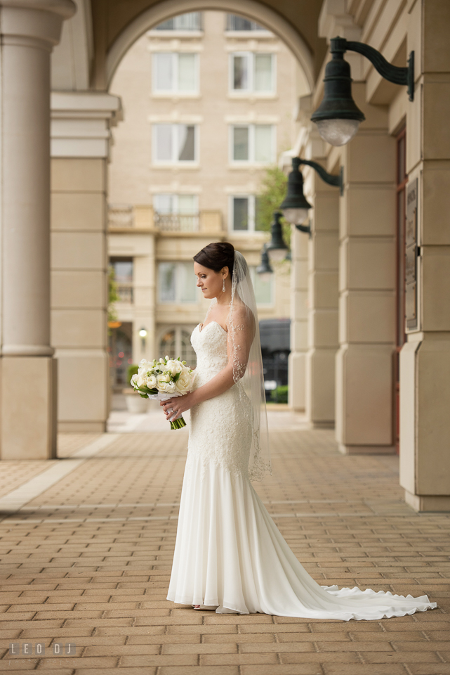 Westin Annapolis Hotel bride with wedding gown from Mary's Designer Bridal Boutique holding bouquet photo by Leo Dj Photography