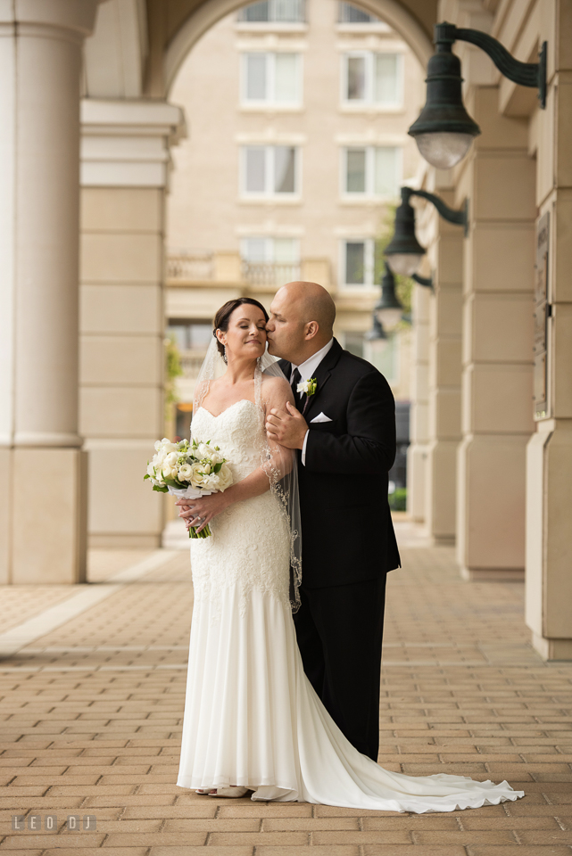 Westin Annapolis Hotel groom hold and kissed bride photo by Leo Dj Photography