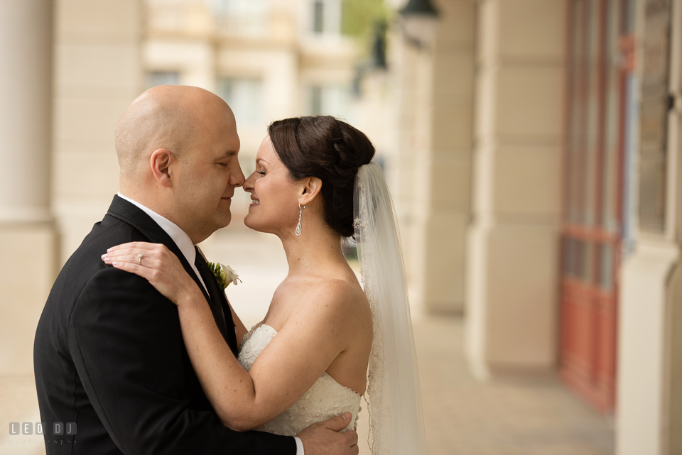 Westin Annapolis Hotel bride and groom hudding and cuddling during first look photo by Leo Dj Photography