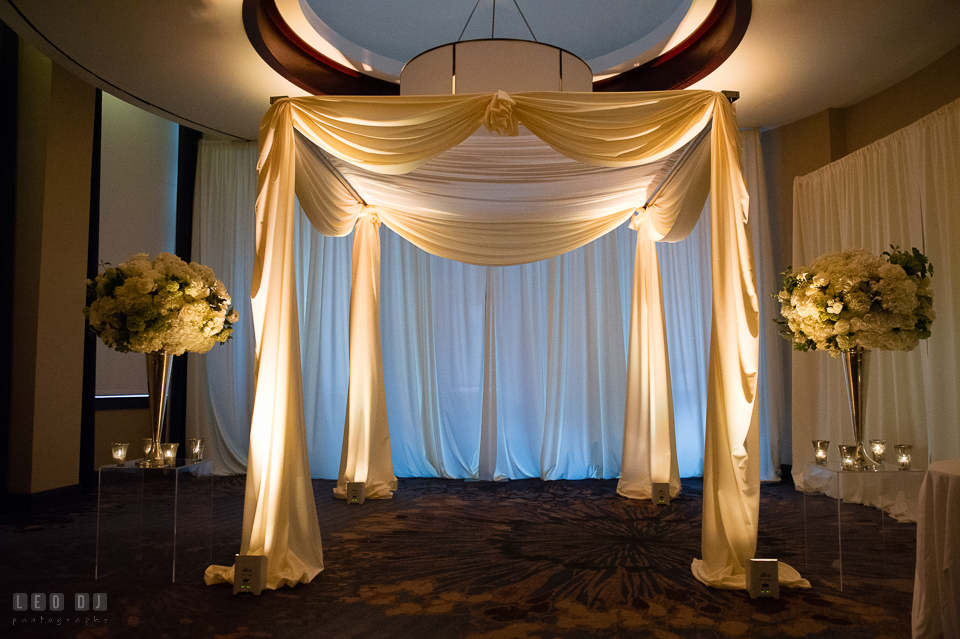 Westin Annapolis Hotel ceremony canopy with custom drapes and uplighting by Event Dynamics photo by Leo Dj Photography