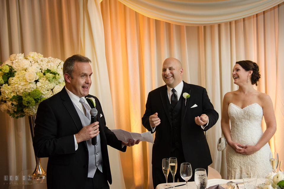 Westin Annapolis Hotel bride and groom laughing listening to speech from best man photo by Leo Dj Photography