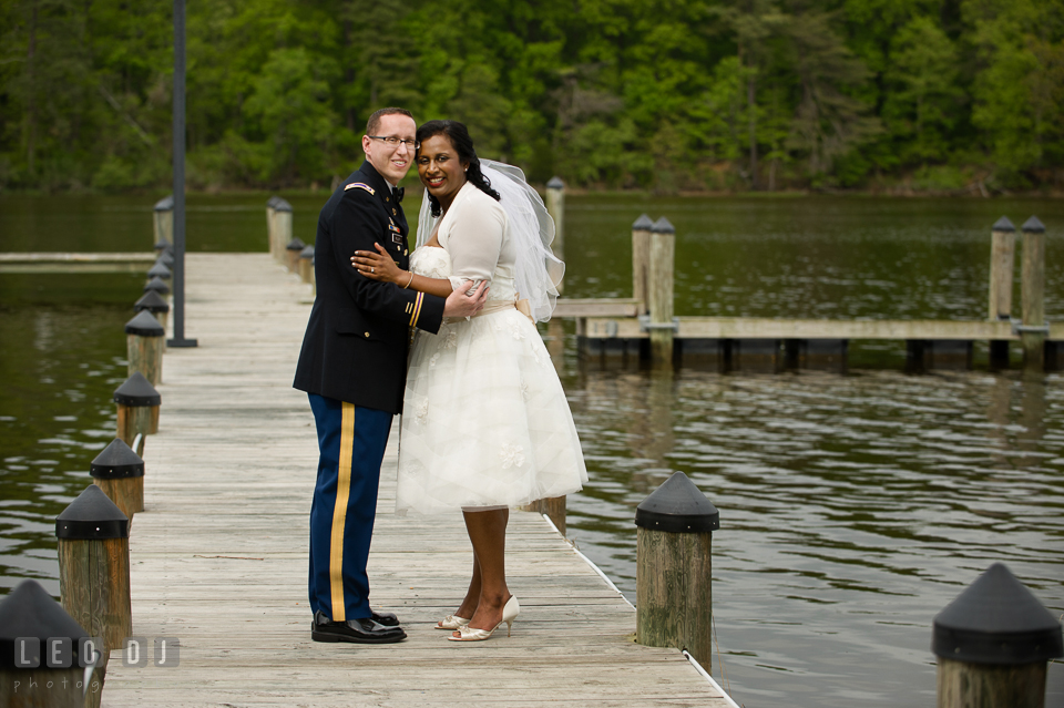 Bride and Groom posing by the water. Aspen Wye River Conference Centers wedding at Queenstown Maryland, by wedding photographers of Leo Dj Photography. http://leodjphoto.com