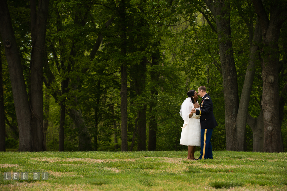 Bride and Groom slow dancing by the woods. Aspen Wye River Conference Centers wedding at Queenstown Maryland, by wedding photographers of Leo Dj Photography. http://leodjphoto.com