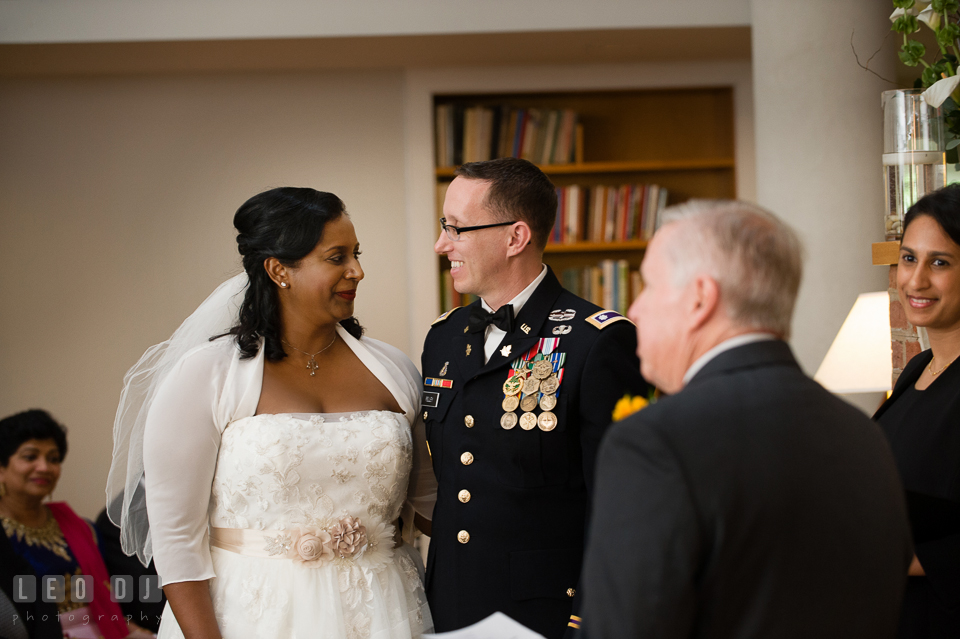 Bride and Groom looking at each other during reading. Aspen Wye River Conference Centers wedding at Queenstown Maryland, by wedding photographers of Leo Dj Photography. http://leodjphoto.com