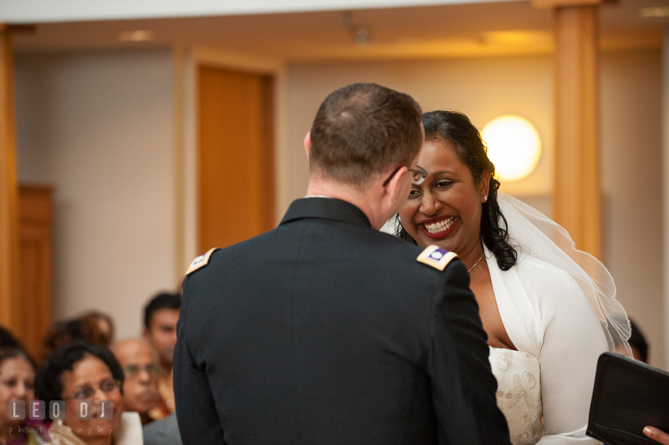 Bride and Groom smiling during the wedding vow. Aspen Wye River Conference Centers wedding at Queenstown Maryland, by wedding photographers of Leo Dj Photography. http://leodjphoto.com