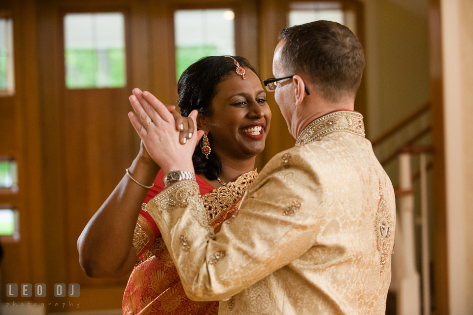 Bride smiling while looking at Groom during first dance. Aspen Wye River Conference Centers wedding at Queenstown Maryland, by wedding photographers of Leo Dj Photography. http://leodjphoto.com