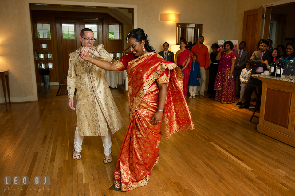 Groom twirling Bride during their first dance wearing Indian outfit. Aspen Wye River Conference Centers wedding at Queenstown Maryland, by wedding photographers of Leo Dj Photography. http://leodjphoto.com