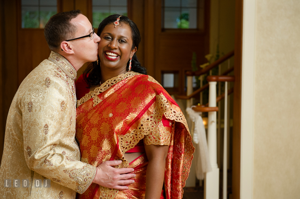 Groom kissed Bride on the cheek. Aspen Wye River Conference Centers wedding at Queenstown Maryland, by wedding photographers of Leo Dj Photography. http://leodjphoto.com