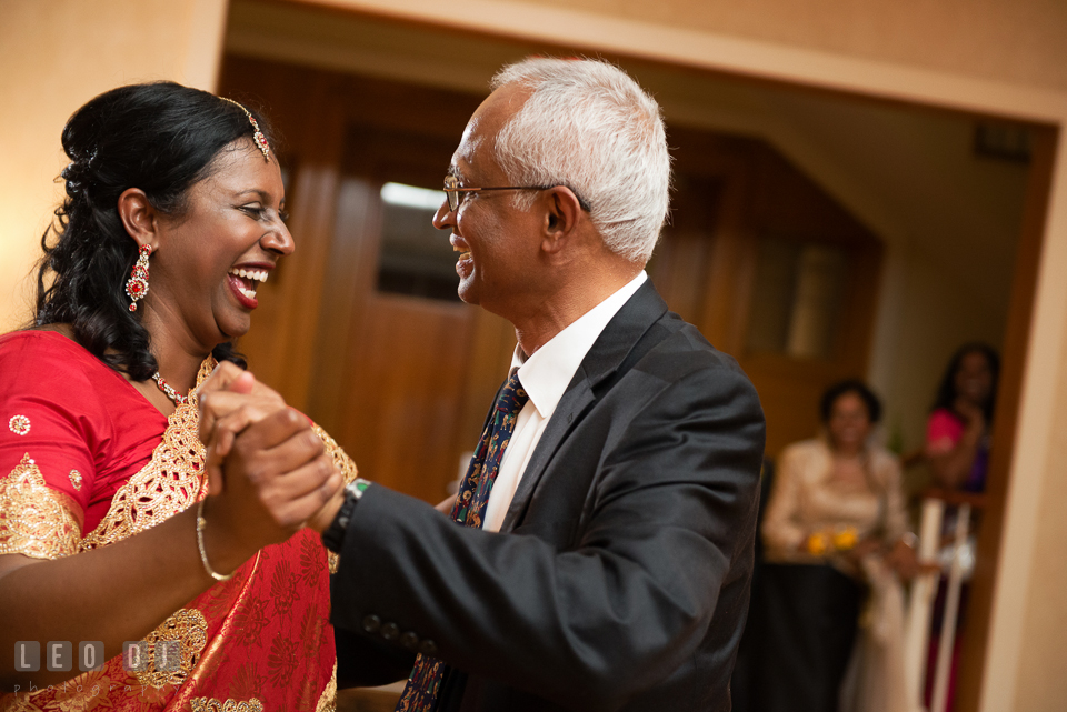 Bride laughing during Father-daugther dance. Aspen Wye River Conference Centers wedding at Queenstown Maryland, by wedding photographers of Leo Dj Photography. http://leodjphoto.com